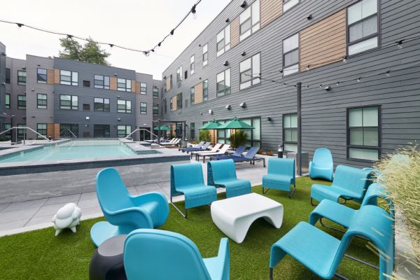 VERVE Boise outdoor courtyard with pool and lounge seating.