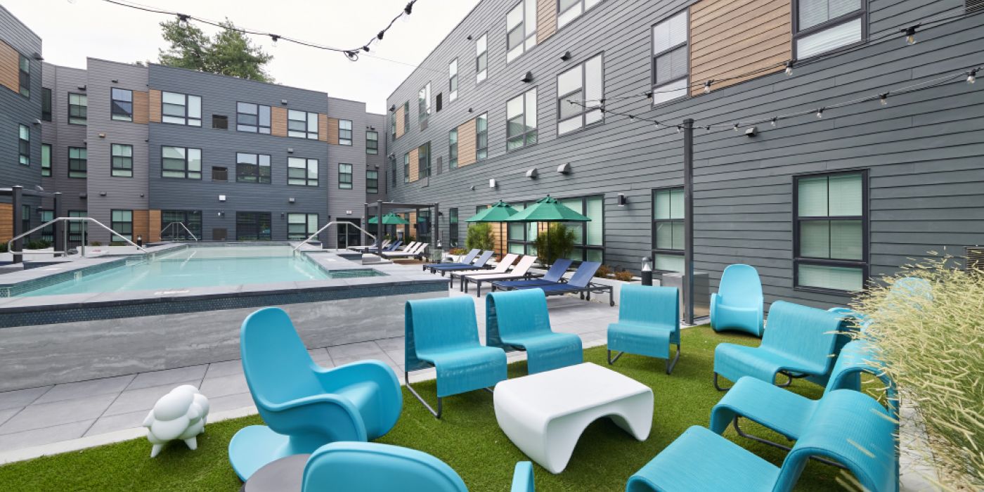 VERVE Boise outdoor courtyard with pool and lounge seating.
